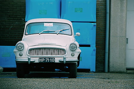 focus photography of white car thumbnail