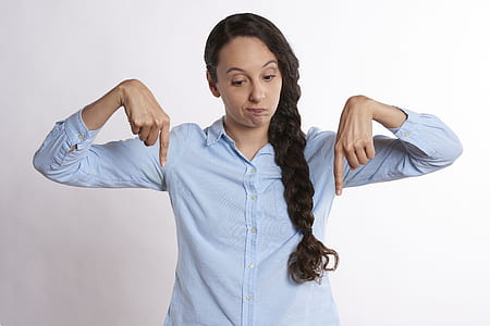 woman pointing on bottom thumbnail