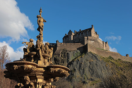 view of castle atop a mountain thumbnail