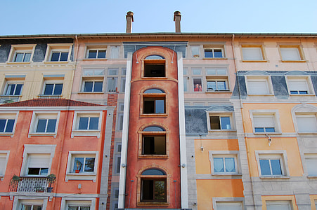 photo of pink and brown painted building thumbnail