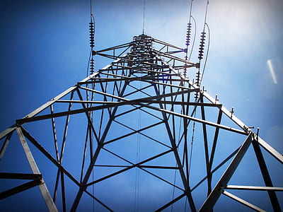 worm's eye-view photography of gray transmission tower thumbnail