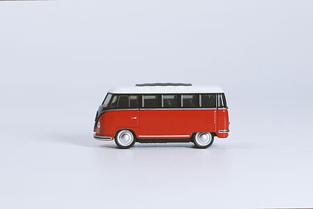 Red Volkswagen T1 Die-cast Toy on White Surface thumbnail