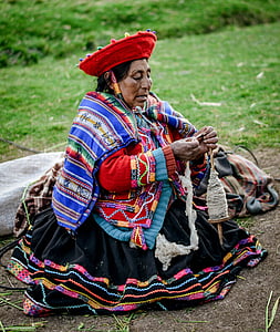 woman wearing multicolored long-sleeved top thumbnail
