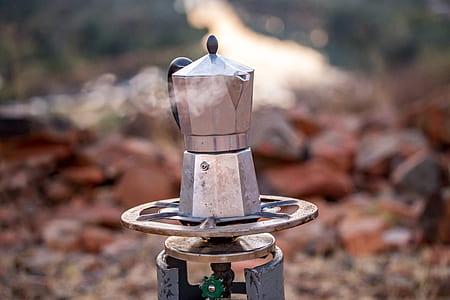 selective focus photography of gray mocha pot on propane tank thumbnail