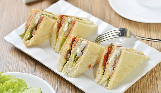 slice sandwich on white plate thumbnail
