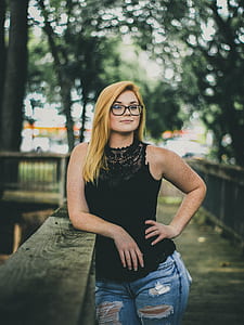 woman wearing black sleeveless top thumbnail