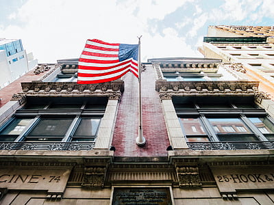 flag of American hanging on building thumbnail
