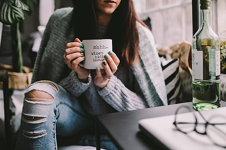Girl drinking wine in her mug thumbnail