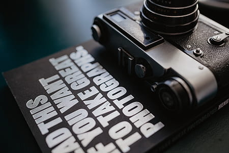 Old analog camera and photography book thumbnail