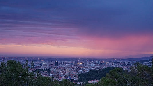 aerial photo of city under orange sky thumbnail