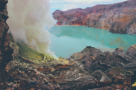 volcano steam vents on rock formations thumbnail