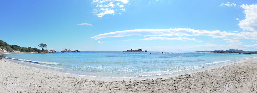 fish-eye lens photography of beach island daytime thumbnail