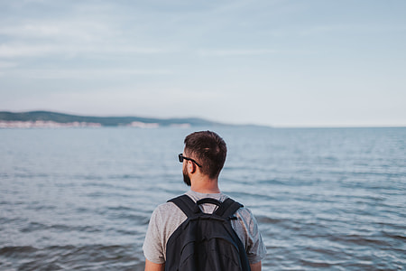 Man looking out to sea thumbnail