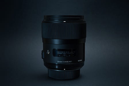 black DSLR camera lens thumbnail