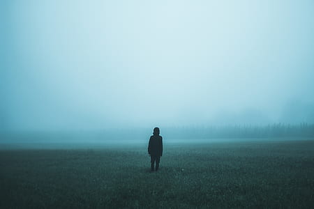 person standing on field thumbnail