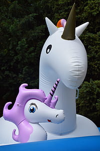 two white-and-purple unicorn inflatable floaters thumbnail