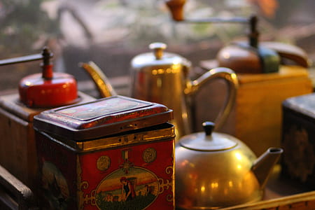 selective focus photography of red trinket box beside kettle thumbnail