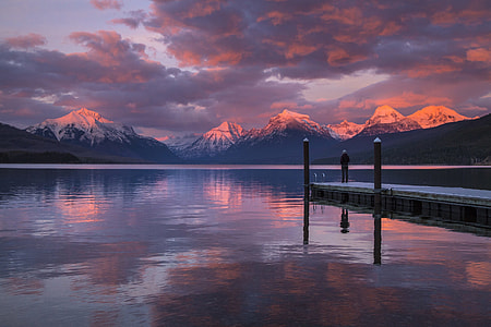 panoramic photo of man standing on the fishing dock thumbnail