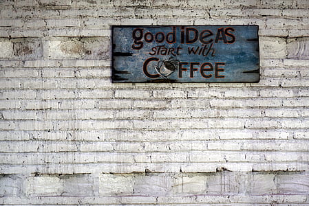 blue quote board on white concrete wall thumbnail