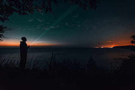 Silhouette of Person during Sunset thumbnail