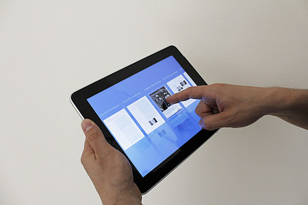 person holding tablet thumbnail