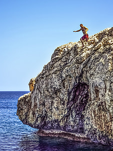 man standing on mountain thumbnail