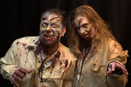 man and woman wearing zombie costume thumbnail