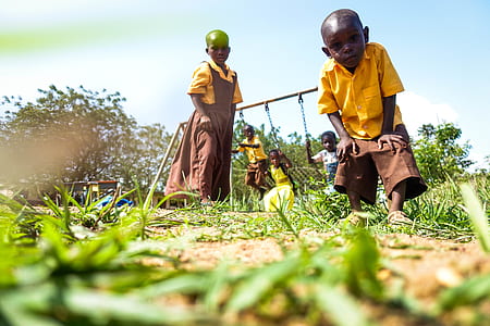 children playing on swing thumbnail