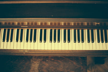 sephia photography of piano keys thumbnail