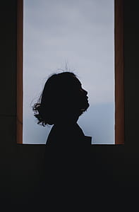woman near open window thumbnail