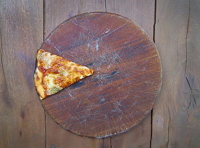 sliced pizza on pizza tray thumbnail