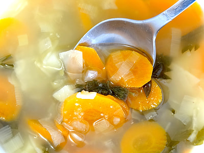 gray stainless steel spoon on cooked sliced vegetables thumbnail