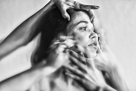 person holding woman's head thumbnail