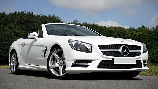white Mercedes-Benz convertible coupe on road thumbnail