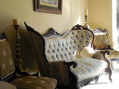 brown wooden framed yellow and grey padded tufted couch between two armchairs thumbnail