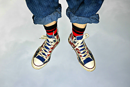 person showing plimsolls thumbnail