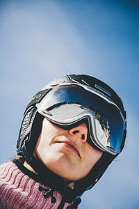 low light photography of person wearing black helmet thumbnail