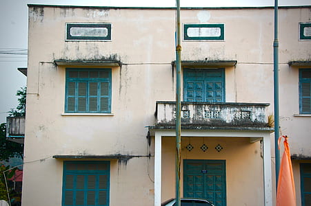 beige concrete house thumbnail