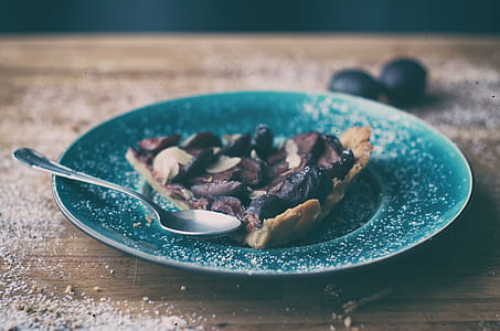 pie on green plate with spoon thumbnail