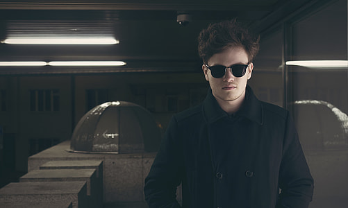 man wearing black suit and sunglasses thumbnail
