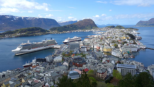 aerial photograph of cityscape on body of water thumbnail