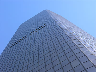 low angle photography of gray building thumbnail