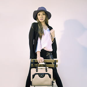 woman wearing black jacket posing thumbnail