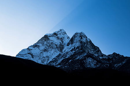 snow covered mountain during daytime thumbnail