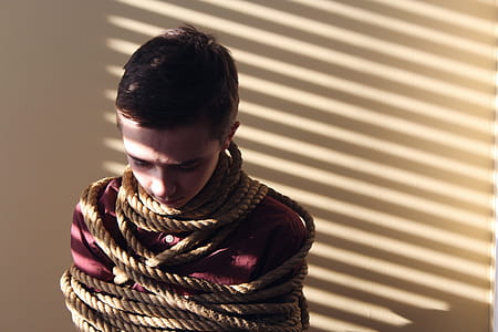 Photo of a Boy Tied With Ropes thumbnail
