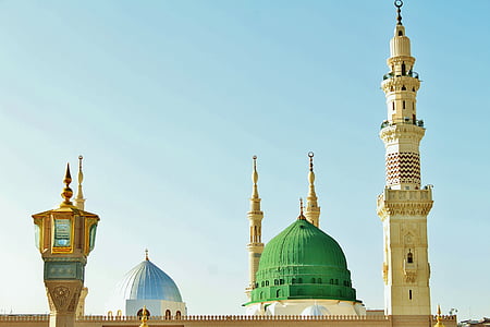 green and beige painted pointed building thumbnail