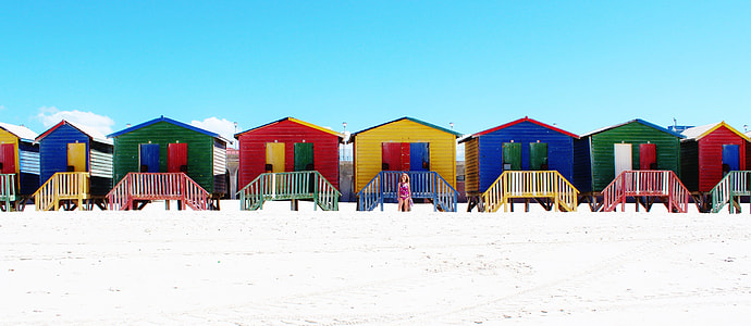 assorted colored beach wooden cottages thumbnail