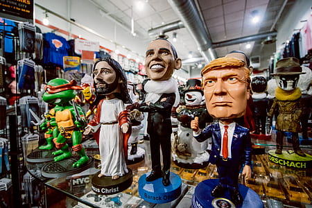 bobbleheads on glass surface thumbnail