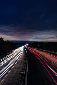 time lapse photo of vehicle on roadway thumbnail