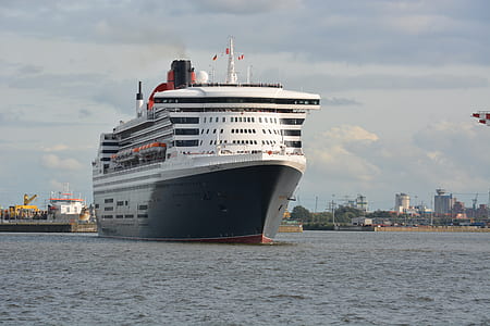 white cruise ship on body of water during daytime thumbnail